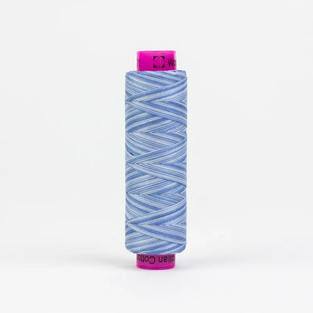 Sky blue thread spool with tightly wound strand