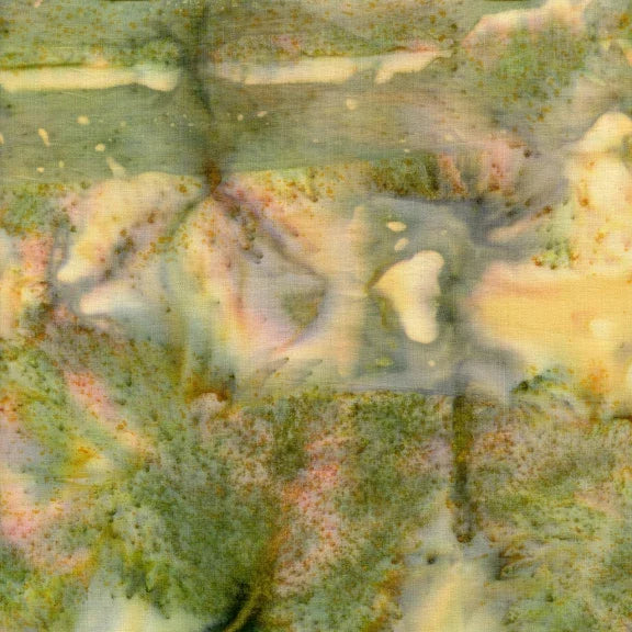 Abstract patterned fabric swatch with green and beige watercolor-like shapes