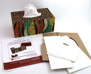 DIY tissue cover box kit with patterned fabric panels, blank inserts, and instruction sheets