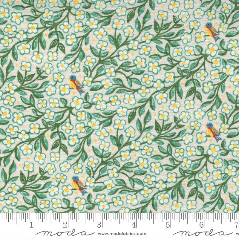 Quilting cotton fabric by Moda Fabrics, light pearl base with green leaves and yellow flowers
