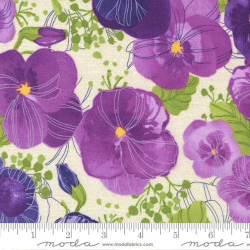 Cream cotton fabric with large purple pansy flowers, green leaves, and stems