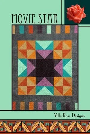 Movie Star quilt pattern with multicolor geometric star blocks by Villa Rosa Designs