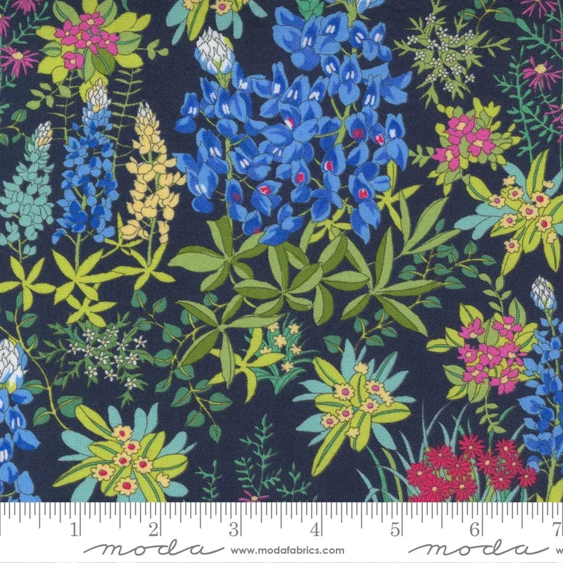 Moda Fabrics wildflowers quilt fabric with indigo background and colorful floral pattern