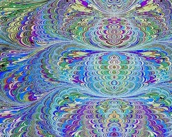 Multicolor marbled fabric with layered circular swirls in blue, teal, and purple
