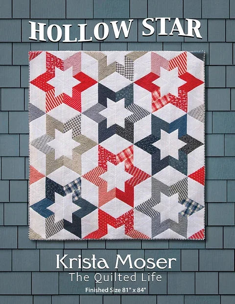 Hollow Star quilt with red, white, and gray star blocks and checker borders