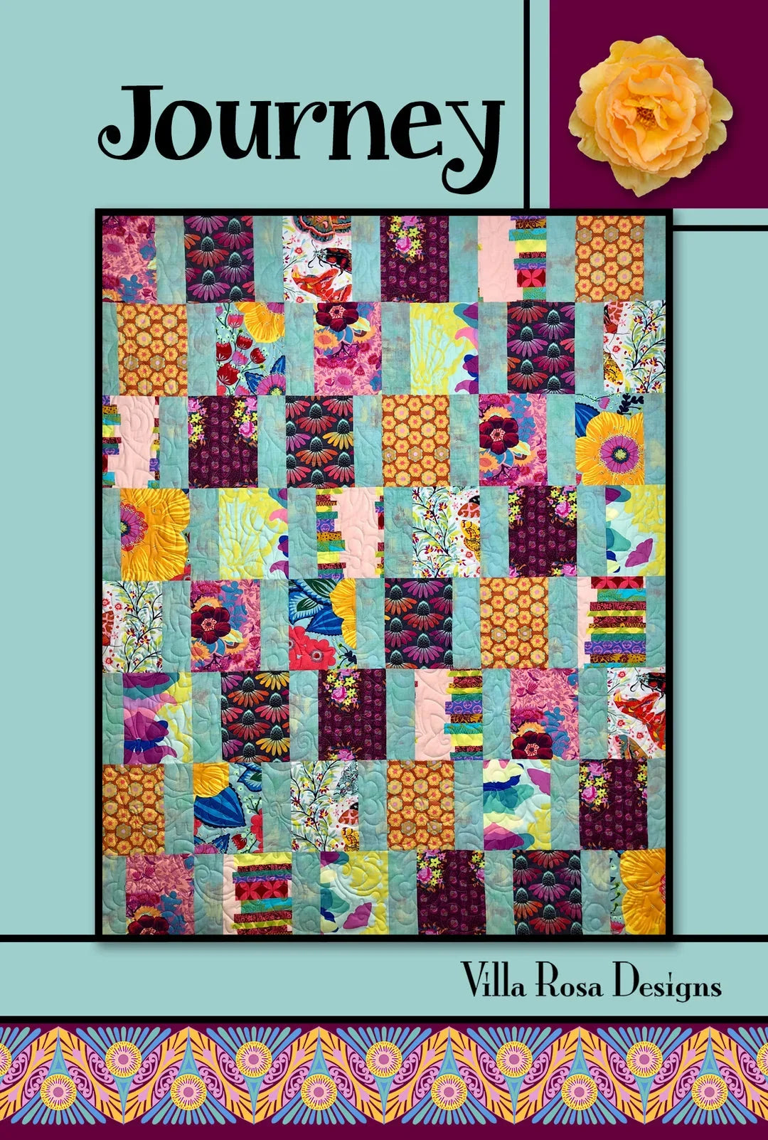 Colorful patchwork quilt pattern with square blocks and floral geometric designs