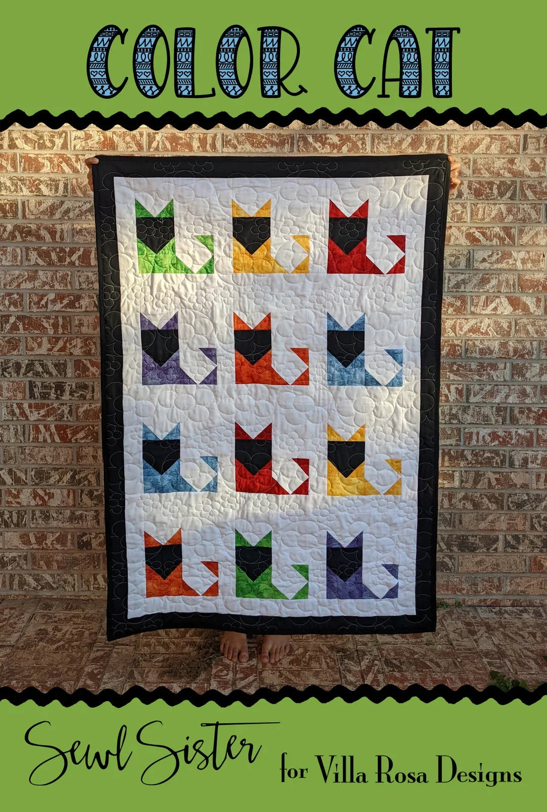 Quilt top with light fabric field and multicolor cat silhouette squares, framed by black.