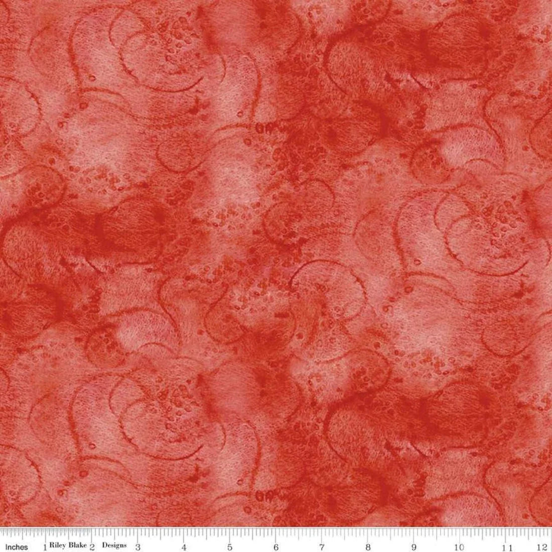 Red fabric with berry-toned painterly swirl pattern