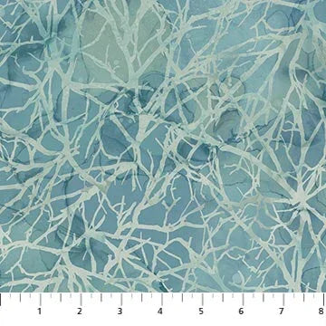 Quilt fabric with pine branches pattern, pale branches on light blue background