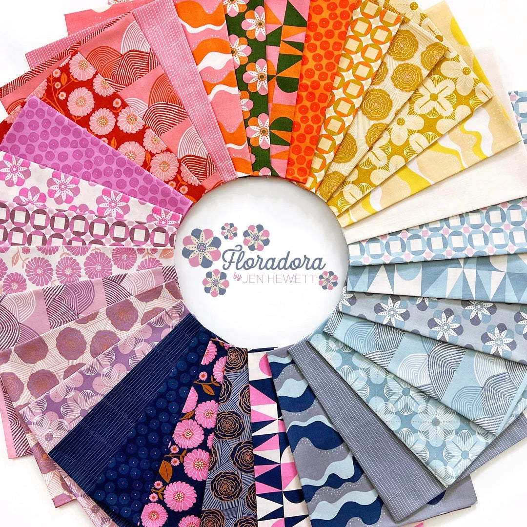 Floradora 10in fabric precut squares fan display in pink, orange, yellow, and blue