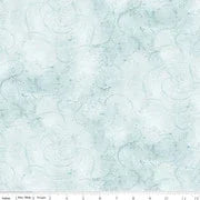 Bleached denim fabric with painters swirl pattern in light blue