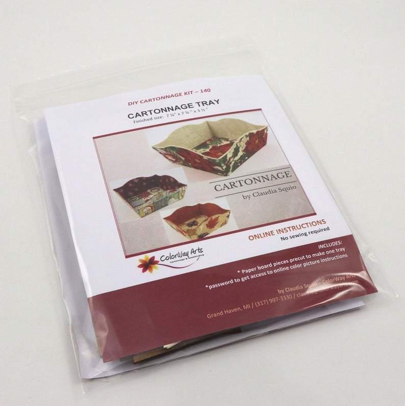 Cartonnage fabric tray kit in clear plastic packaging with instructions card