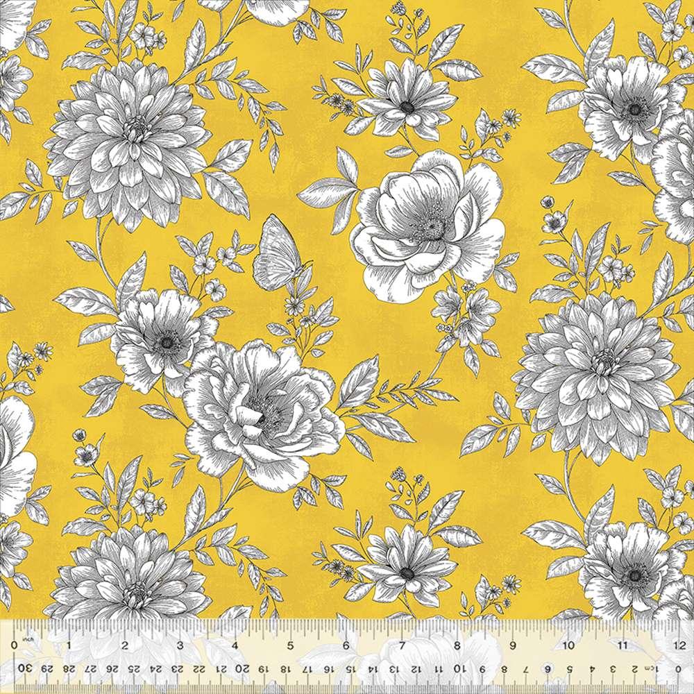Floral cotton fabric in mustard yellow with white and gray blossoms and small blue sprigs