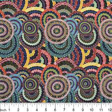Multicolor spiral patterned fabric swatch on dark background