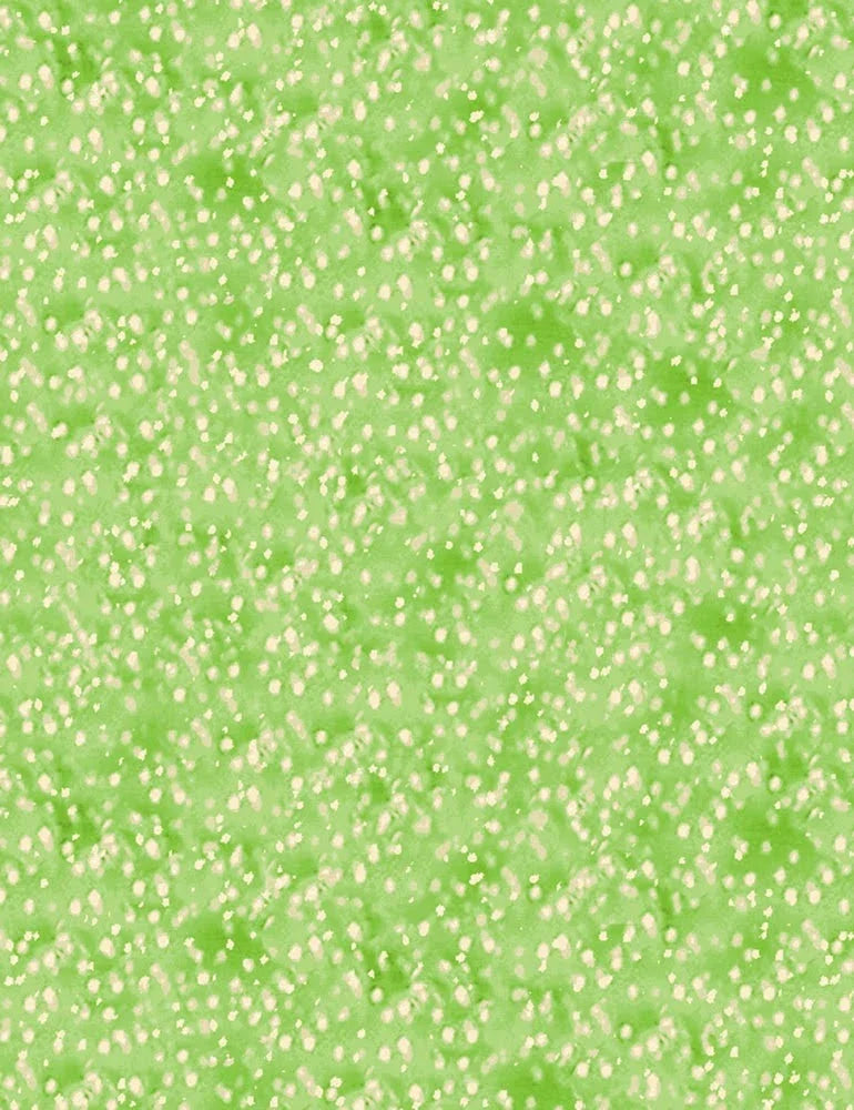 Green cotton quilting fabric with small white painted dots