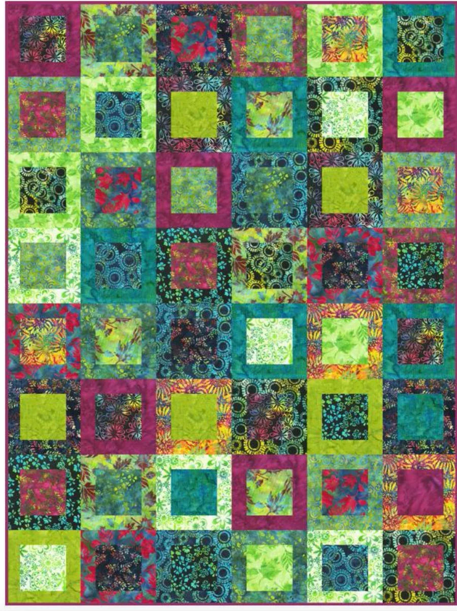 Quilt top pattern of multicolor squares and rectangles with teal, green, yellow, and magenta