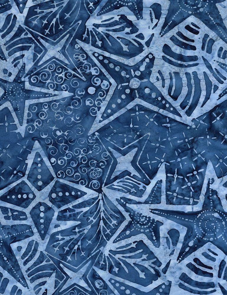 Graphical painted star quilt fabric in blue with white star designs
