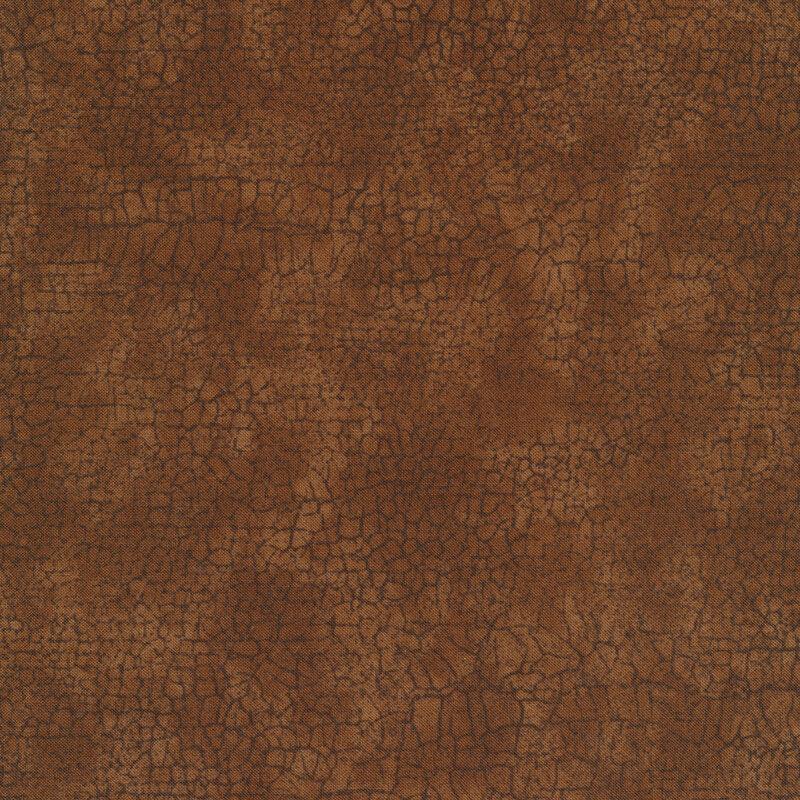 Brown crackle-pattern fabric with fine mottled lines and textured surface