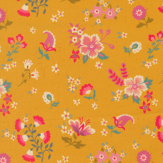 Mustard floral cotton fabric with multicolor blossoms and foliage pattern