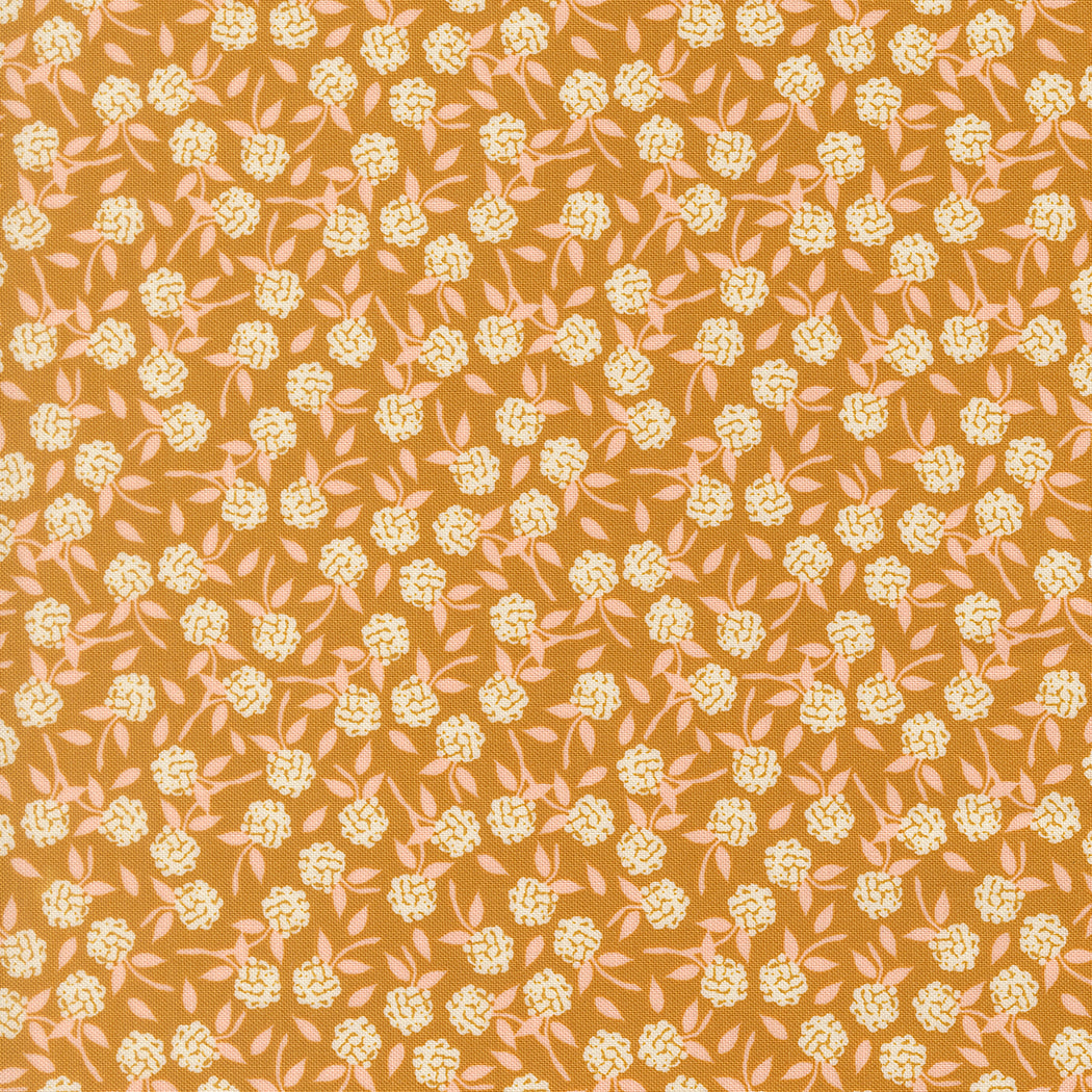 Wildbriar Golden 43223 12 cotton fabric with a small cream floral and leafy print on a golden ground