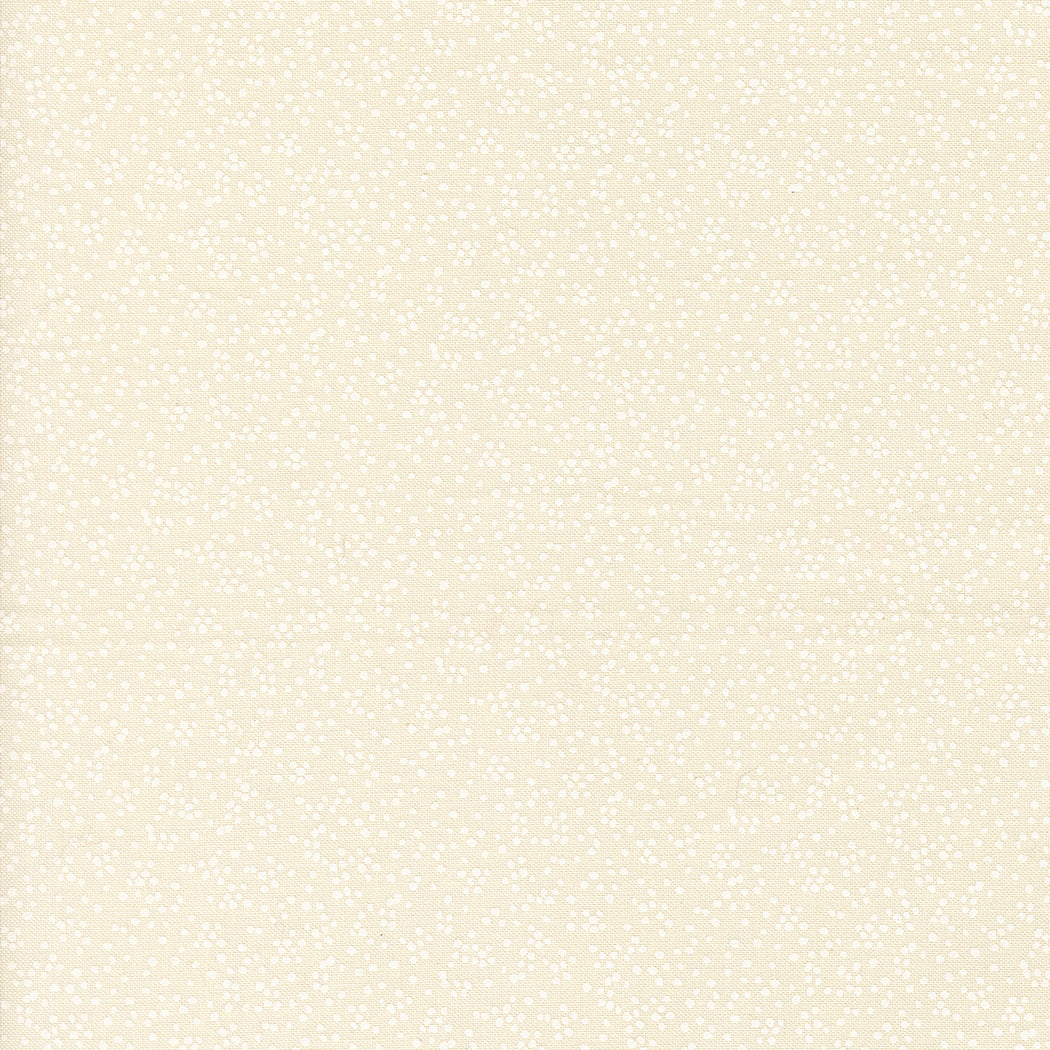 Wildbriar fabric in porcelain white with a dense pattern of tiny scattered dots