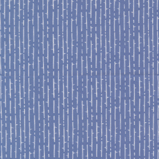 Blue vertical striped fabric with scattered cross-like motifs and small squares