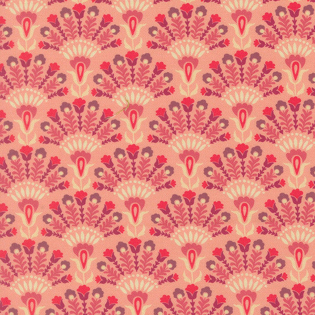 Floral cotton fabric with coral pink and red repeating fan and tulip motifs