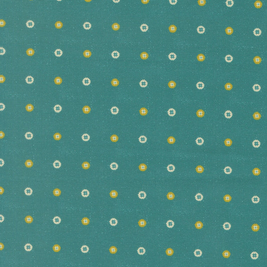 Teal floral fabric with small dotted blossom pattern