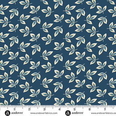Indigo fabric with scattered small leaf motifs in gold and teal
