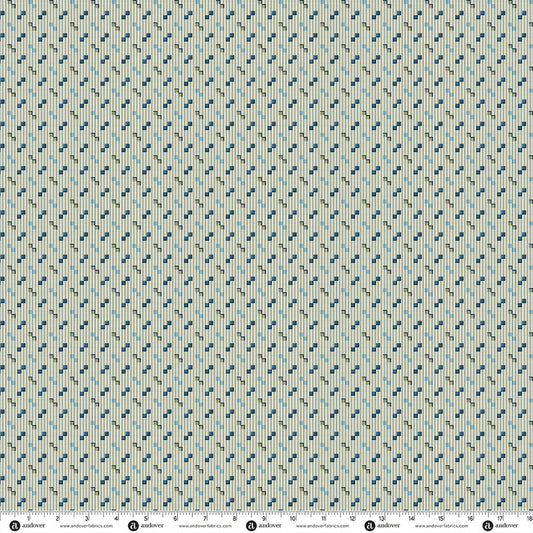 Blue Willow patterned cotton fabric swatch with small blue motifs on white background