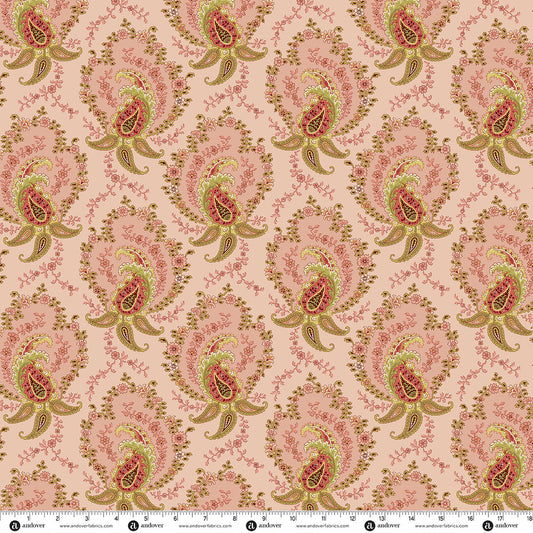Paisley quilting fabric with green and red teardrop motifs on light pink background