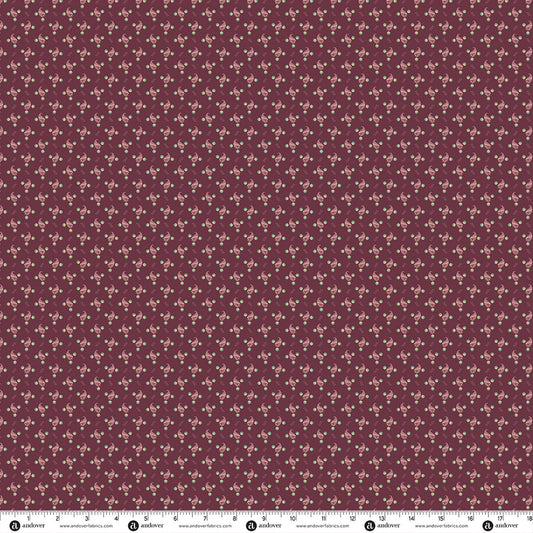 Plum quilting fabric with tiny scattered pink and cream floral sprigs pattern