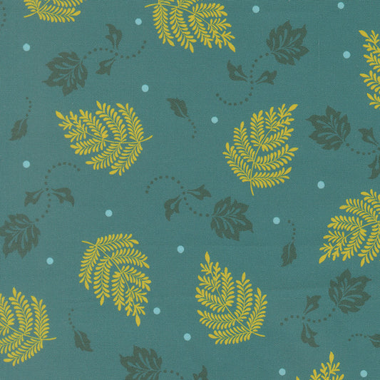 Teal quilting fabric with scattered yellow paisley leaf motifs