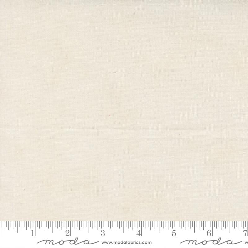 Cream quilting cotton fabric with subtle speckled texture