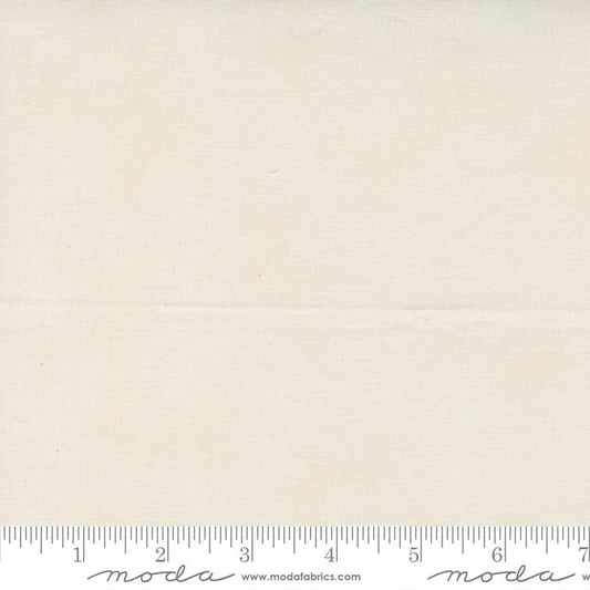 Cream quilting cotton fabric with subtle speckled texture