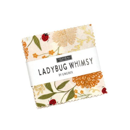 Ladybug Whimsy mini charm pack of floral and ladybug fabric squares, wrapped with a paper label