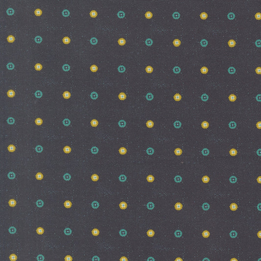 Midnight fabric with scattered teal and yellow small starburst floral motifs