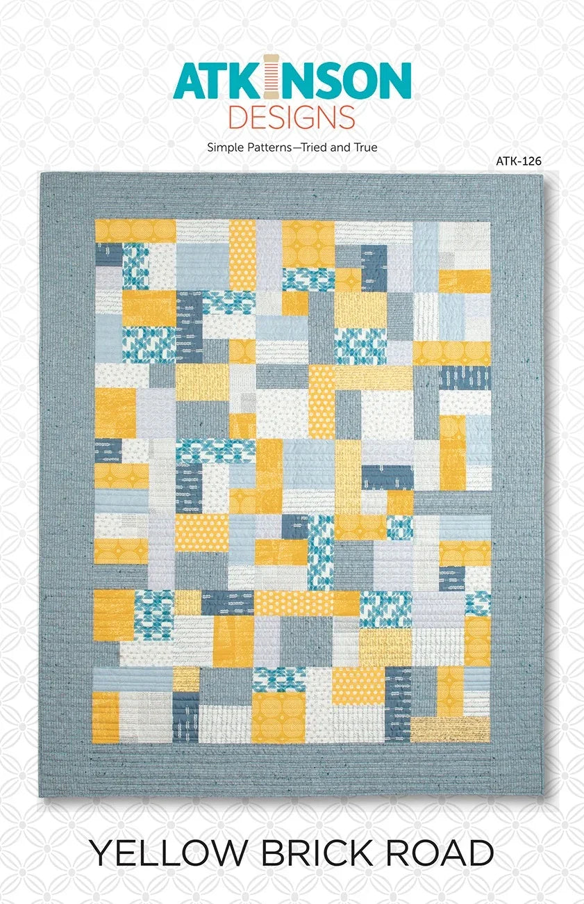 Yellow Brick Road quilt block pattern with blue and yellow patchwork squares