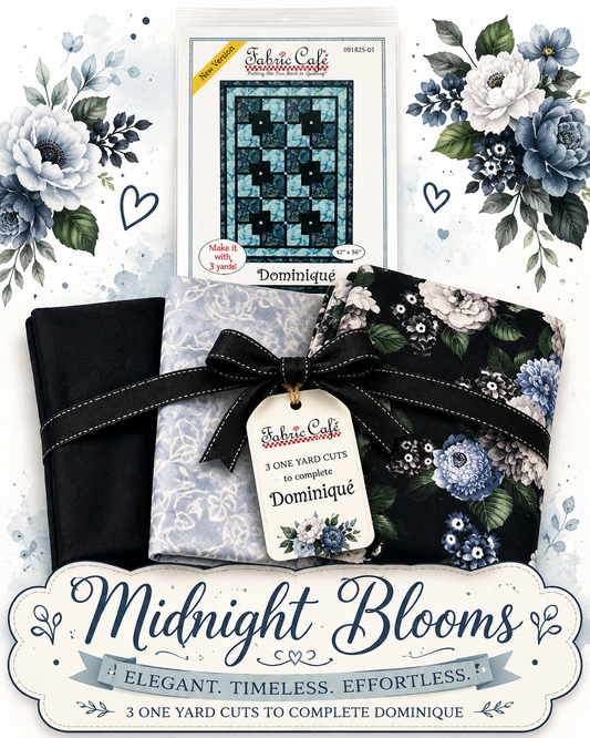 Fabric Cafe Dominique quilt kit with midnight blue and white floral cotton fabrics.