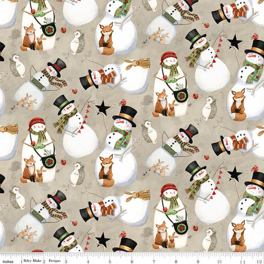 Holiday cotton fabric with repeating snowmen, animals, and gingerbread motifs