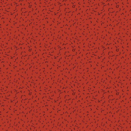 Red quilting fabric with scattered tangled leaf and vine print