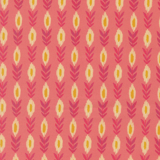 Rose pink fabric with repeating vine, leaf, and teardrop motifs in yellow and red