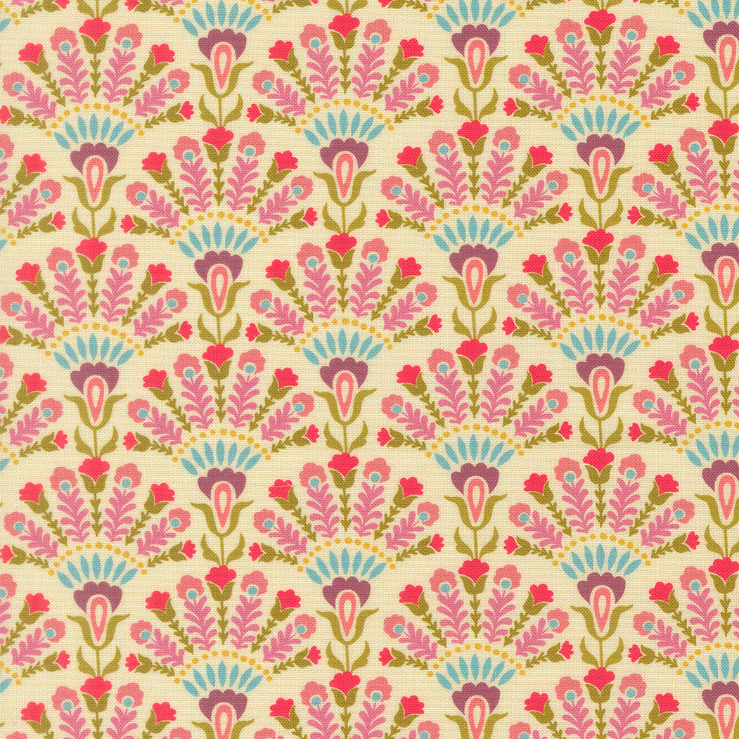 Floral cotton fabric on opaline cream with pink, teal, and red blossoms