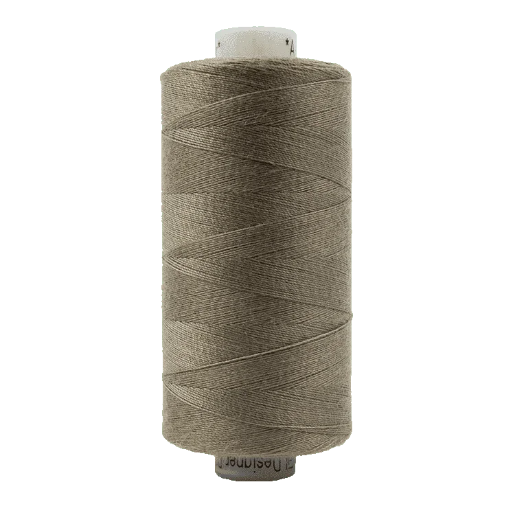 Parchment tan polyester thread spool, 40wt all-purpose, 1000m length