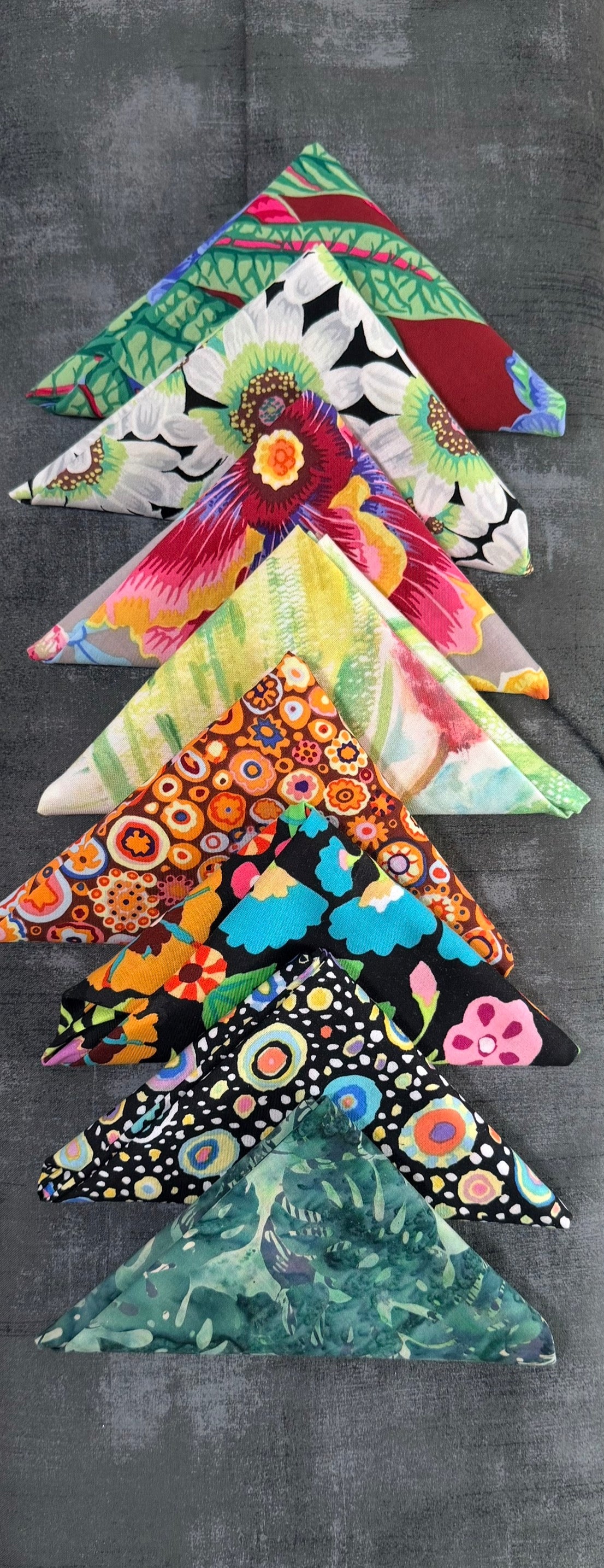 Colorful fabric applique tree with layered triangular patchwork pieces