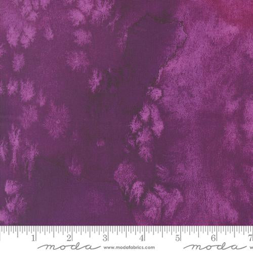 Plum purple floral quilting fabric with leafy vine motif and marbled texture