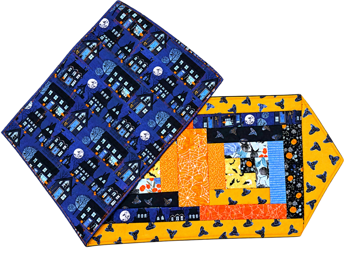 Halloween log cabin table runner quilt kit, blue and orange blocks with spooky icons