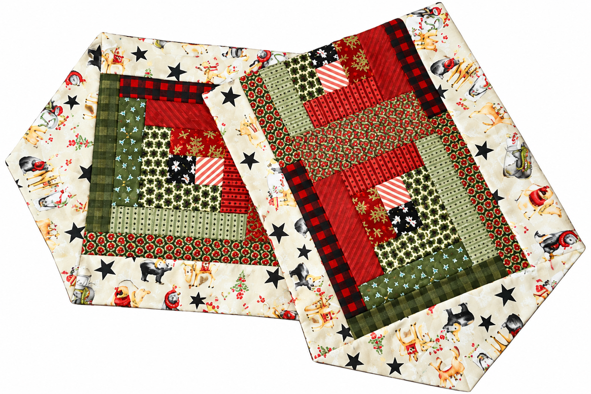 Folded Christmas log cabin table runner kit with red and green patchwork blocks, star border