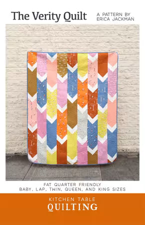 Multicolor chevron patchwork quilt top with vertical zigzag blocks