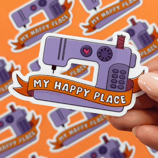 Sewing machine sticker reading "My Happy Place" with purple sewing icons